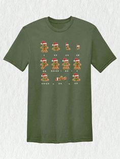 a green t - shirt with gingerbreads on it