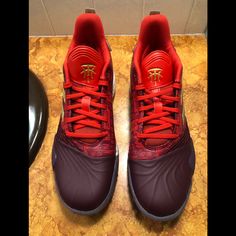 Brand New Low-top Red Basketball Shoes With Red Sole, Red Low-top Basketball Shoes With Red Sole, Red Mid-top Basketball Shoes With Cushioned Footbed, Red High-top Fade-resistant Basketball Shoes, Red Cushioned Mid-top Basketball Shoes, Red Lace-up Basketball Shoes With Boost Midsole, Red Custom Sneakers With Boost Midsole For Sports, Adidas Red Basketball Shoes With Cushioned Footbed, Red Basketball Shoes With Boost Midsole And Round Toe