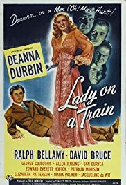 an old movie poster for lady on a train, starring actors from the 1950's