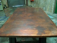 a table that is made out of some kind of metal