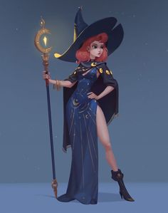 a woman dressed as a witch holding a staff