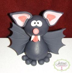 a toy bat sitting on top of a table