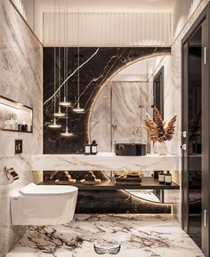 an elegant bathroom with marble walls and flooring, along with a large mirror above the toilet