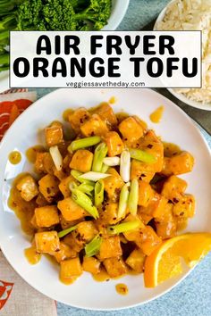 an air fryer orange tofu on a plate with broccoli and rice