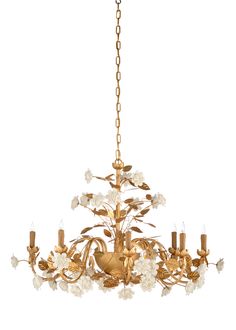 a gold chandelier with white flowers on it