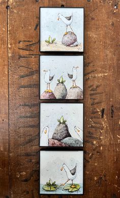 three paintings depicting birds on rocks in water