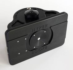 a black camera with the word hyper scope on it's front and back side