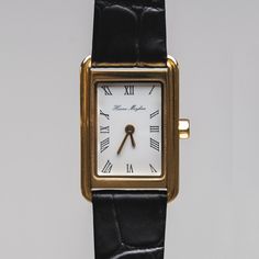 THE ICON WATCH Timeless Yellow Gold Watches, Timeless Yellow Gold Watch With Rectangular Dial, Classic Leather Watch Accessories For Office, Classic Watch With Leather Strap And Rectangular Dial, Timeless Rectangular Watch, Timeless Gold Watches, Classic Analog Display Watch Accessories For Formal, Classic Analog Watch With Rectangular Dial, Elegant Analog Office Watches