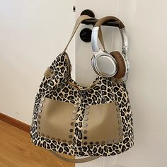 This fashionable shoulder bag features a classic leopard patchwork pattern. Constructed of high-quality durable fabric, this tote features plenty of storage space with two exterior pockets and an open-top design. A timeless style, this leopard patchwork shoulder bag is perfect for everyday use. Designed by 4COLORDRESS Normal Body, Patchwork Patterns, Women's Wardrobe, Color Khaki, Black Tote Bag, Clothes Collection, Timeless Classic, Winter Collection, Leather Tote