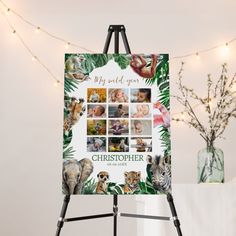 an easel with a photo collage on it next to a christmas tree and lights