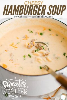 a bowl of hamburger soup with a spoon in it