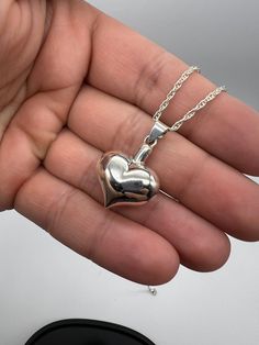 This is the perfect gift and a unique way to carry your loved ones close to your heart. ❤️Material:925 sterling silver; ❤️Free Engraving available: the back or font can be personalized with engraving message. 10characters max. ❤️Included in the package:18" matching chain,gift box, filling funnel kit; ❤️ Care Instructions Though the materials used is made of sterling silver, I recommend you to not sleep, swim, or spray chemicals (i.e. perfumes, lotions, or body spray) on to the necklace to preserve its longevity. Please follow these tips to preserve the longevity of the necklace. To clean, it is best to use a soft microfiber cloth to clean the jewelry from smudges. Modern Heart, Urn Pendant, Memorial Jewelry, Microfiber Cloth, Body Spray, Lotion, Care Instructions, First Love, Gift Box