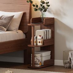 a bed with a wooden headboard and shelves in the corner, next to a white rug