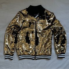 Original Price Shown. New. Never Worn. Trendy Gold Outerwear For Party, Trendy Gold Party Outerwear, Gold Long Sleeve Outerwear For Streetwear, Gold Sequined Outerwear For Spring, Gold Sequined Outerwear For Winter, Casual Fall Outerwear With Sequins, Casual Sequined Outerwear For Fall, Fitted Gold Winter Outerwear, Trendy Fitted Gold Outerwear