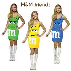 three women in m & m costumes standing next to each other with their hands on their hips