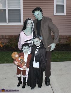 the family is dressed up for halloween