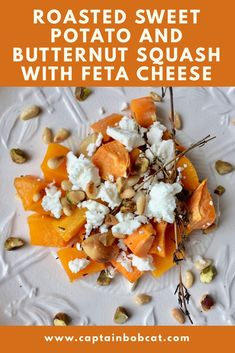 roasted sweet potato and butternut squash with feta cheese on a white platter