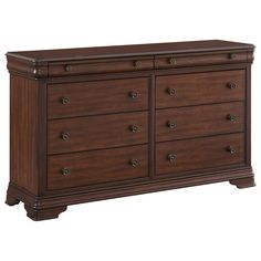 a wooden dresser with many drawers and knobs on the bottom drawer, it is dark brown