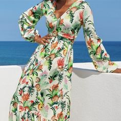 Colorful And Unique In Tropical Sea Life Print Style, You Are Ready For An Escape In This Effortlessly Comfortable Ruffle Hem Maxi Dress, Enhanced With A Sexy V Neckline Atop A Belted Empire Waist And Finished With Flowy Long Sleeves. Sold Out In Stores. New With Tags. Size 6 Long Sleeves With Elastic Cuffs Resort, Vacation, Tropical V-Neckline Fixed Empire Waist With Front Belt (Not Adjustable) Hidden Back Zipper Fully Lined Ruffle Hem 100% Viscose Imported Category Women Dresses Maxi Size 6 Co Summer Tropical Print Long Sleeve Maxi Dress, Long Sleeve Tropical Print Maxi Dress For Summer, Long Sleeve Tropical Print Maxi Dress For Beach, White Tropical Printed Dress, Casual Long Sleeve Dresses With Tropical Print, Tropical White Printed Dress, Casual Long Sleeve Tropical Print Dresses, White Long Sleeve Tropical Dress, V-neck Maxi Dress With Tropical Print For Vacation