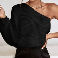 Dare To Show A Little Skin In This New Black Ribbed One-Shoulder Sweater. This Cute Little Number Is Shaped By Ribbed Stretch Knit And Has A Sexy One-Shoulder Neckline That Leads Into A Long Loose Sleeve. Pair This Top With High-Waisted Denim And A Trendy Ankle Bootie For A Smoldering Look. One Sleeve Sweater, One Sleeve Top Outfit, One Shoulder Sweater, Couple Shoots, Simple Summer, Pullover Outfit, American Eagle Sweater, Women Sweaters, Ankle Bootie