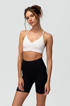 Look back at it. A moderate support double-layer bra with a ruched front and sleek racerback design. Made with 4-way stretch and encased elastic opening. | Studio T- Back Bra in Bright White Look Back At It, Yoga Travel, Rainbow Shop, Bootcut Pants, Spiritual Gangster, Mens Essentials, Tank Dress, Sweater Jacket, Crew Socks