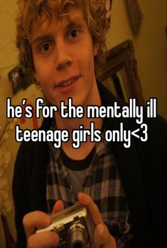 a young man holding a camera with the caption he's for the mentally ill teenage girls only 3