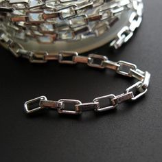 Material: 925 Sterling silver made in Italy.Size: 4.5 mm long *2.5mm wide, 0.8mm thickness.Weight: 6 gram per foot.Quantity: 18 inches or 1.5 feet.Model:101040This chain is available in:Oxidized Sterling Silver: https://www.etsy.com/listing/50962190For different quantities of this chain, click here: https://www.etsy.com/listing/196053784================HOW TO FINISH================To turn this beautiful, unique chain into a necklace, bracelet or anklet. Just click below:Jumprings:https://www.ets Rings Bands, Wholesale Silver Jewelry, Mens Silver Necklace, Sterling Silver Chain Necklace, Sterling Jewelry, Foot Jewelry, 925 Sterling Silver Chain, Silver Accessories, 925 Silver Jewelry