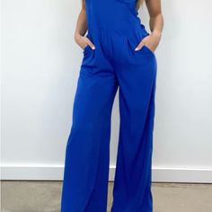 Royal Blue Jumpsuit With Adjustable Straps. Perfect For Everyday Or Special Occasions. Blue Stretch Jumpsuits And Rompers For Work, Trendy Blue Jumpsuits And Rompers For Day Out, Stretch Blue Overalls For Summer, Chic Blue Jumpsuits And Rompers With Pockets, Casual Blue Stretch Overalls, Blue Stretch Casual Jumpsuits And Rompers, Blue Overall Jumpsuits And Rompers With Pockets, Blue Overalls For Spring, Blue Overall Jumpsuit With Pockets