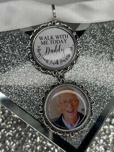 a silver and white photo frame with an old man's face on it that says, walk with me today daddy