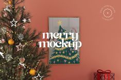 a decorated christmas tree in front of a pink wall with merry mockup written on it