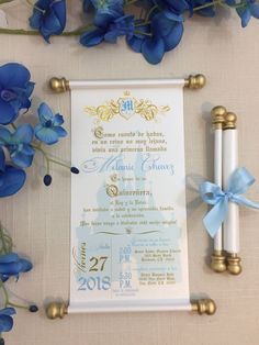 a blue and white wedding stationery with flowers