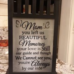 a sign that reads mom you let us beautiful memories your love is still our guide and though we cannot see you, you're always by our side