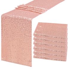 pink glitter table runner and napkins set on white background with clipping for text