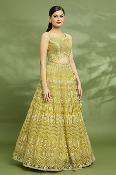 Golden mustard cancan attached lehenga featuring geometric motif in sequin, gota and applique work. Paired with a padded hand embroidered tassel detailed blouse and a hand embroidered dupatta. - Aza Fashions Designer Yellow Sequin Sets, Yellow Anarkali Choli With Sequins, Yellow Sequined Lehenga For Diwali, Yellow Lehenga With Sequins For Festive Occasions, Yellow Sequined Choli For Navratri, Traditional Yellow Sequined Choli, Yellow Sequined Choli For Diwali, Hand Embroidered Dupatta, Applique Work