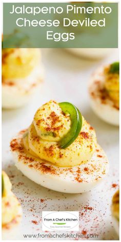 deviled eggs with jalapeno pimentoo and cheese deviled on top