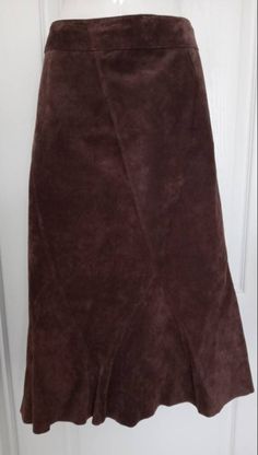 "Brown Ultra Suede Leather Skirt, fully lined. Brand:   Context Color:    Brown Size:  16 Waist Band:  2\" Waist:  18\" side to side Hips: 22\" side to side Length:    29 1/2\"   Measurements were taken from under the waistband to hemline  Kick Pleat:  N/A Material:   100%   Leather Lining:   100% Polyester Made in: China Condition:  Excellent Measurements were taken with garment laying flat.   Please check all measurements, as sizes vary from manufacturer to manufacturer, there are no returns e School Jacket, Kick Pleat, Suede Skirt, Plus Size Skirts, Straight Skirt, Jones New York, Affordable Fashion, Suede Leather, Leather Skirt