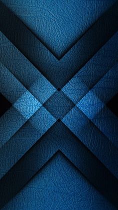 an abstract blue and black background with diagonal lines in the center, as if it were made out of leather