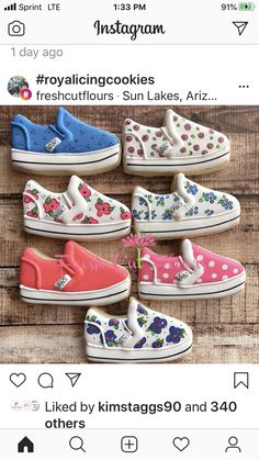 several pairs of shoes with flowers painted on them, all in different colors and sizes