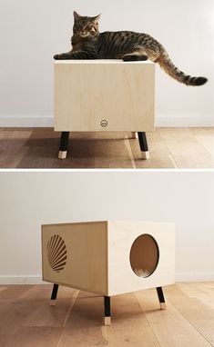 a cat laying on top of a wooden box that is shaped like a stereo system