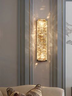 Our Laminated Crystal Wall Light is a beautiful and modern addition to any room. Constructed with stainless steel and shining crystal, this wall light provides a graceful lighting accent that will elevate your home decor. Its contemporary, chic design will leave guests in awe! 
 If you have any questions about our products, please contact us and we will reply to you within 24 hours. 
 Product Size 
 Size: Dia 12cm x H 26cm /  4.7 x H 10.2 
 
 Size: Dia 12cm x H 46cm /  4.7 x H 18.1 
 
 Size: Dia Wall Lamps Living Room, Crystal Wall Lighting, Crystal Wall Sconces, Crystal Wall, Chandelier Floor Lamp, Luminaire Design, Ceiling Chandelier, Chandelier Ceiling Lights, Lead Crystal