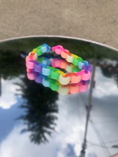 a bunch of bracelets that are on top of a car