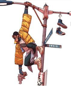 a man hanging upside down on a street sign pole with his feet in the air