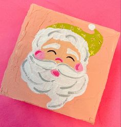 a painting of a santa claus on a pink background with white hair and green hat