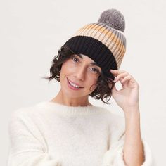 Piccadilly Stripe Black Tan Knit Beanie Hat - rockflowerpaper Winter Striped Hats One Size Fits Most, Striped Winter Hats One Size Fits Most, Playful Warm Hats For Fall, Casual Fall Beanie With Pom Poms, Fall Beanie With Pom Poms For Cold Weather, Playful Fall Hat One Size Fits Most, Casual Beanie With Pom Poms, Casual Pom Pom Hat For Cold Weather, Pom Pom Beanie Hat