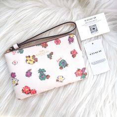 Color: Chalk Multi Material: Printed Coated Canvas And Smooth Leather Condition: Brand New With Tag Style Number: Ca735 Dimensions: 6 1/4" (L) X 4" (H) X 1/2" (W) Msrp $88 Two Credit Card Slots Zip-Top Closure, Fabric Lining Wrist Strap Attached Comes With Coach Gift Receipt 100% Authentic Price Is Firm Comes From Clean & Pet Free Environment Sold Out Everywhere Rare Find White Zipper Pouch Wallet, White Wristlet For Daily Use In Spring, Coach White Wallet With Zipper Pouch, White Pouch Wristlet With Wrist Strap, White Wallets For Spring Gift, White Zipper Pouch Wristlet, White Clutch Wristlet With Zipper Closure, White Clutch Wristlet With Wrist Strap, White Wristlet Clutch With Wrist Strap