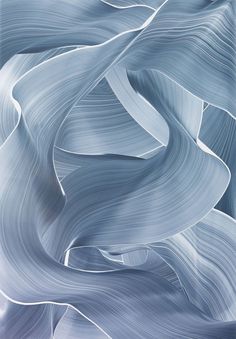 an abstract painting with white and blue colors on the surface, as well as wavy lines