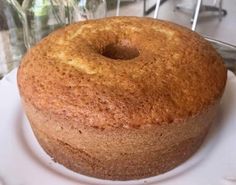 a round cake sitting on top of a white plate