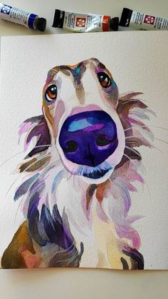 a watercolor painting of a dog's face