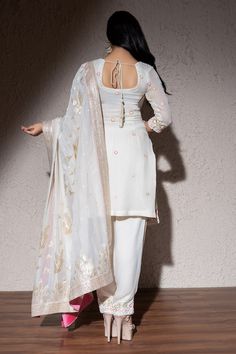 Ivory georgette kurta with all over floral pattern, resham, cut dana, sequin and bead embroidery. Paired with cigarette pant, contrast metallic bird and floral pattern dupatta. - Aza Fashions Designer Off White Georgette Blouse Piece, Off White Georgette Palazzo Set With Dupatta, Cream Georgette Kurta With Sheer Dupatta, Off White Georgette Kurta For Festive Occasions, Festive Off White Georgette Kurta, White Georgette Palazzo Set For Festive Occasions, Festive White Georgette Palazzo Set, Festive Off-white Georgette Kurta, White Fitted Unstitched Suit With Traditional Drape