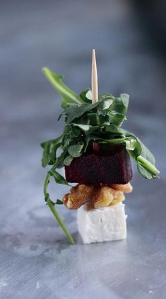 a stack of food sitting on top of a table